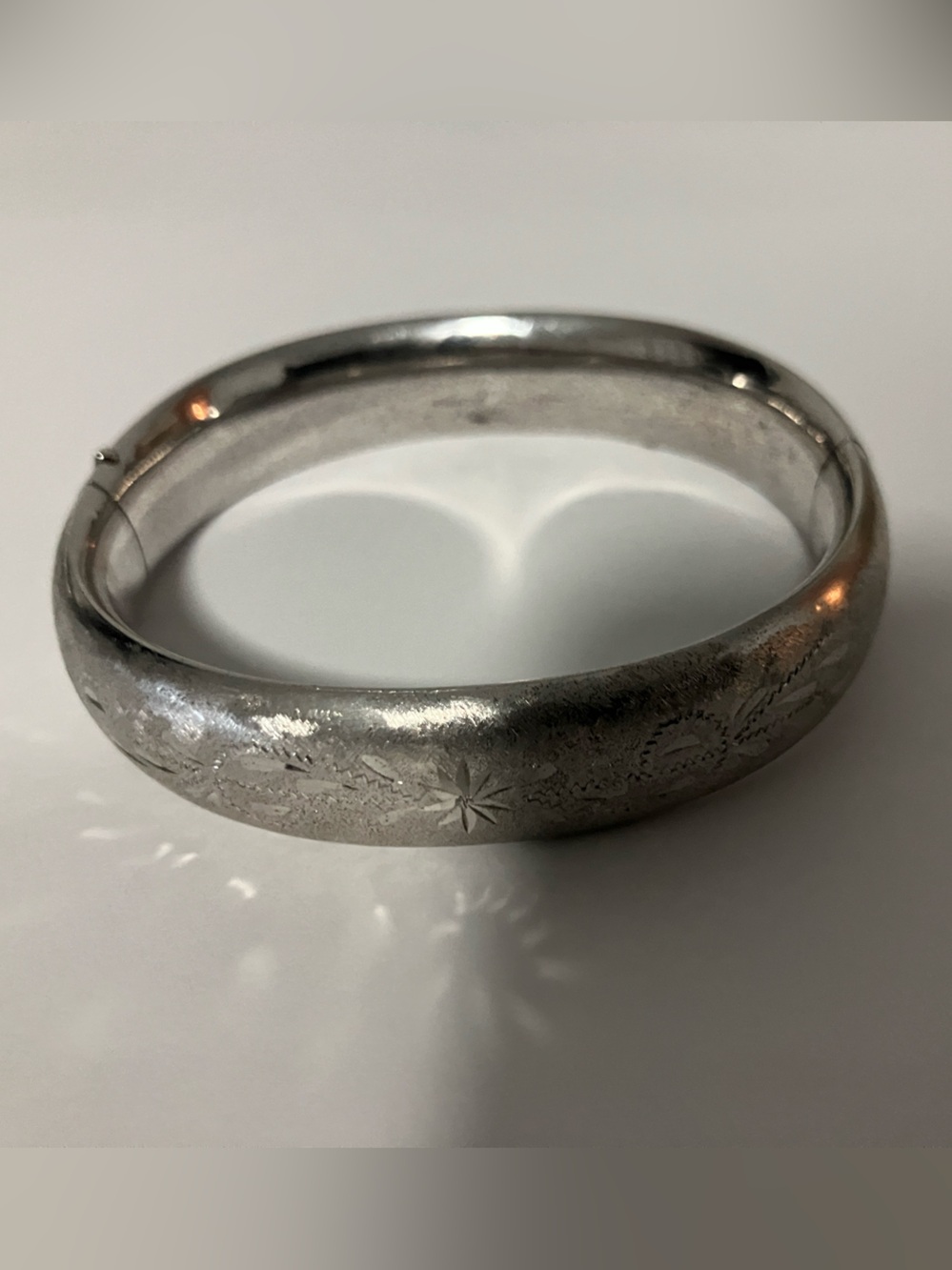 Silver tone bangle bracelet
